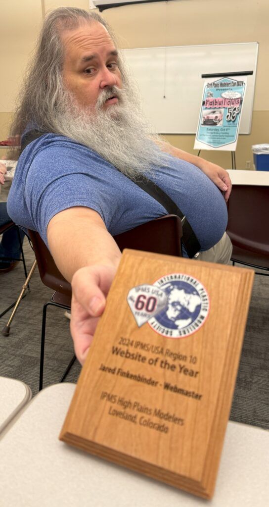 Jared with region10 website of the year award